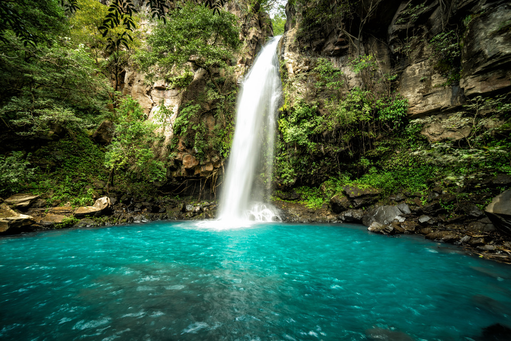 Majestic waterfall in the rainforest jungle of Costa Rica