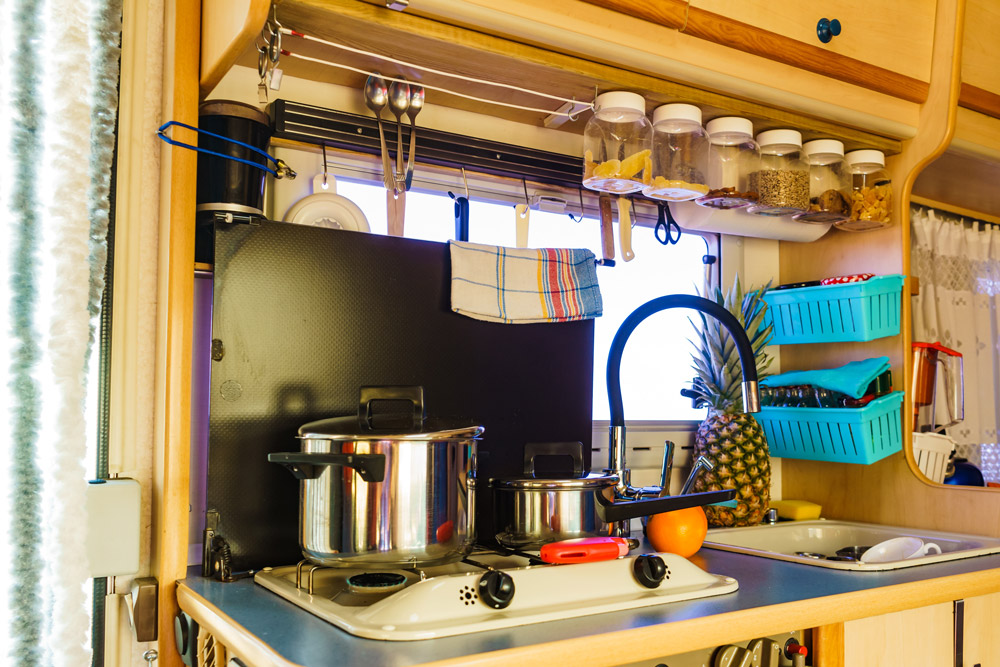https://rvusa.com/blog/wp-content/uploads/2018/09/Camper-storage-ideas-for-RV-kitchens.jpg