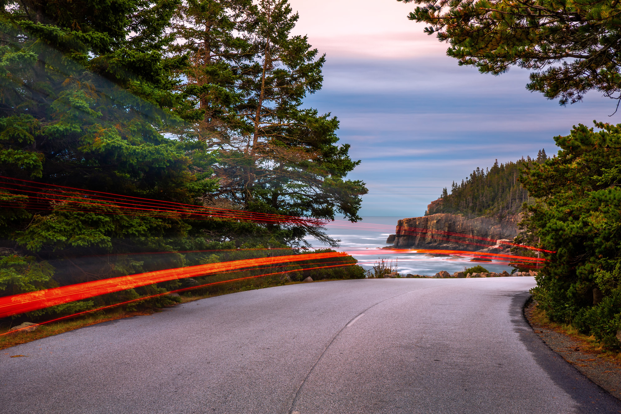 Long exposure of headlights on Park Loop Road in Acadia National Park, One of the best scenic drives in the US