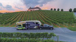 A fifth wheel camps at a winery. Get 15% off Harvest Hosts Memberships 