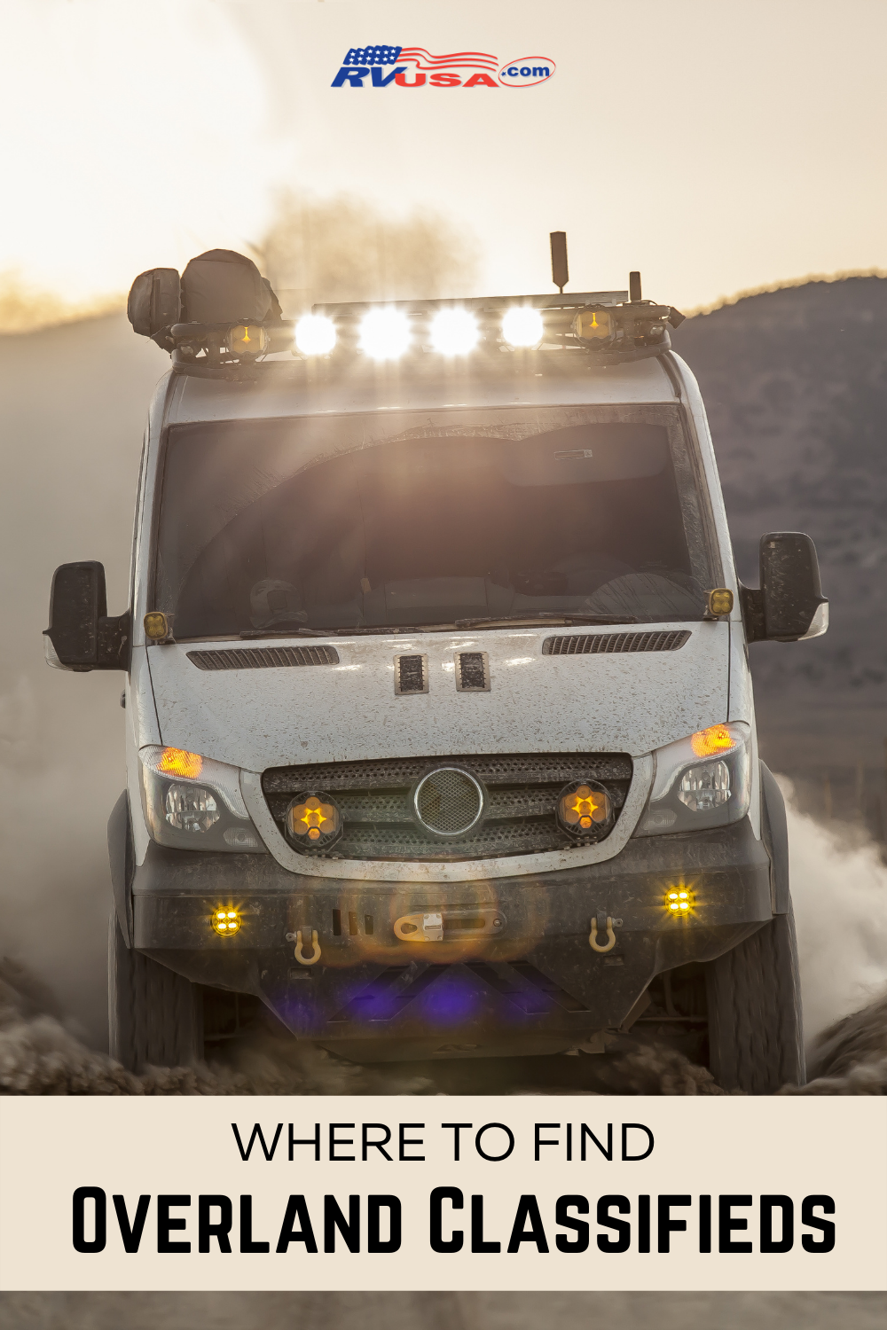 An adventure van drives down a dirt road