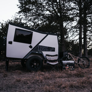 A Dometic fridge with a TAXA habitat. This fridge makes our list of overlanding gifts