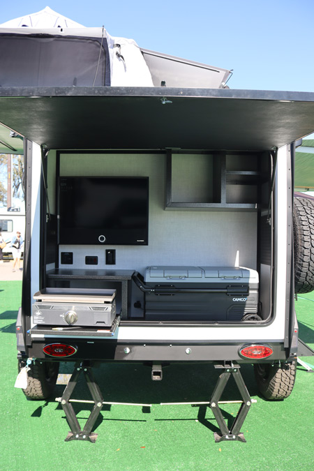 The rear kitchen and entertainment center on the Ember RV Overland Micro Series