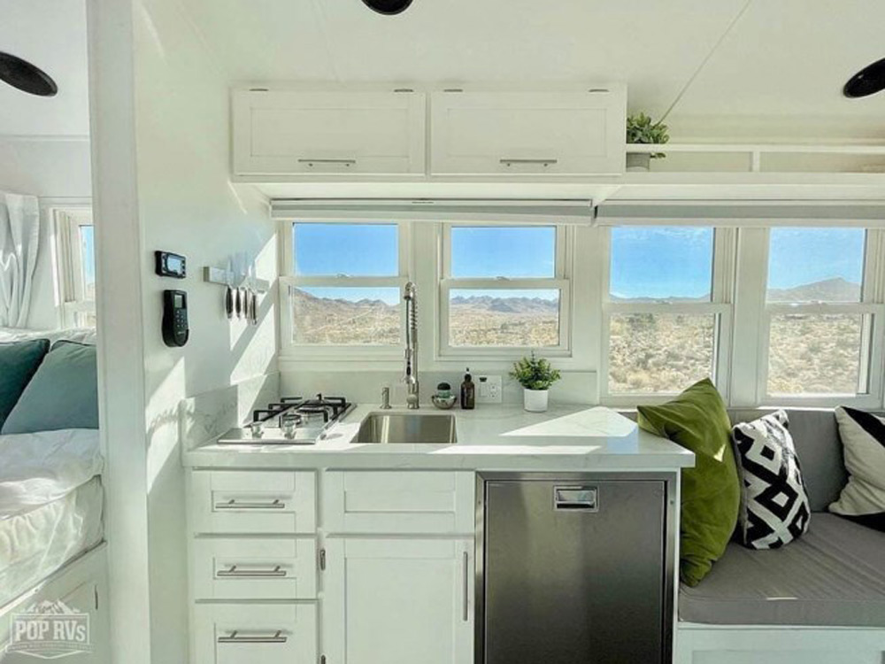 The kitchen of a renovated school bus for sale