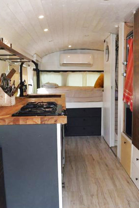 The galley of a renovated school bus for sale