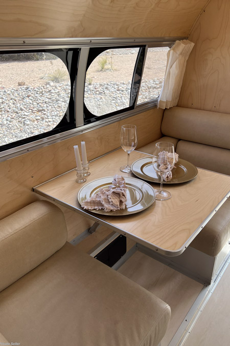 Dining area of a Bowlus Road Chief for sale on RVUSA