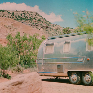 An Airstream parked in the desert. You can find a used RV fore sale by owner like this one on RVUSA