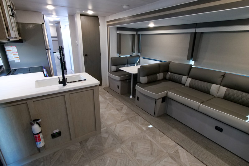 The kitchen and dining area of a Forest River Salem. This is one of the best RVs for 2023.