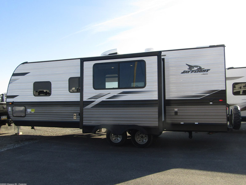 A Jayco Jay Flight parked in an RV lot. This is one of the best RVs for 2023.